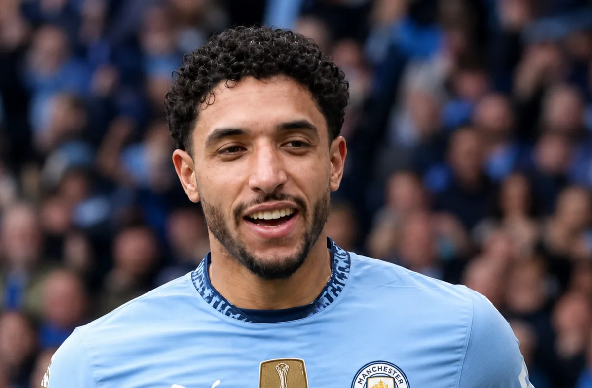 Omar Marmoush in Manchester City training kit, with Tottenham transfer talks advancing.
