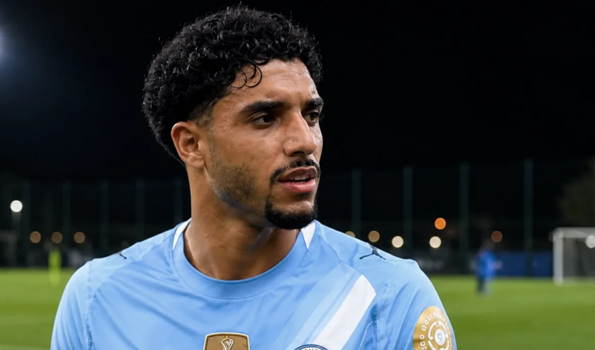 Omar Marmoush of Manchester City in action during a Premier League match, with speculation linking him to a move to Tottenham.